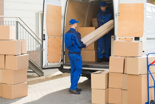 Moving team preparing a home relocation in Collierrow