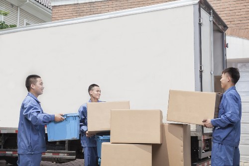 Local man and van removals loading furniture in Collierrow