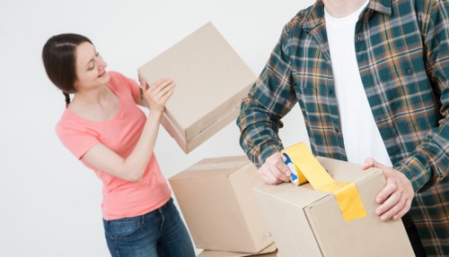 Packed boxes and furniture ready for removals in Collierrow