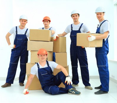 Packed boxes and furniture ready for local removals in Collierrow