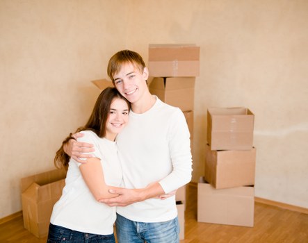Packed boxes and furniture ready for local removal transport