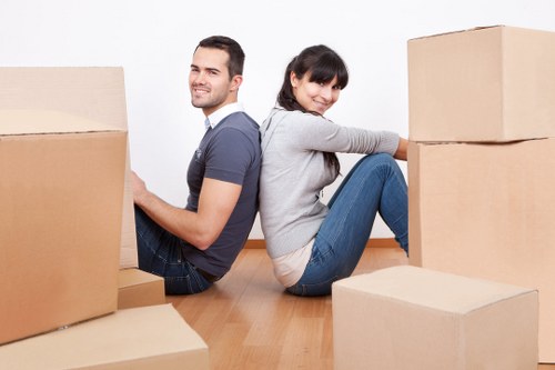 Loading boxes and furniture into a removal van